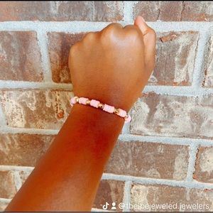Pink clay bead bracelet. Different shades of pink and gold.